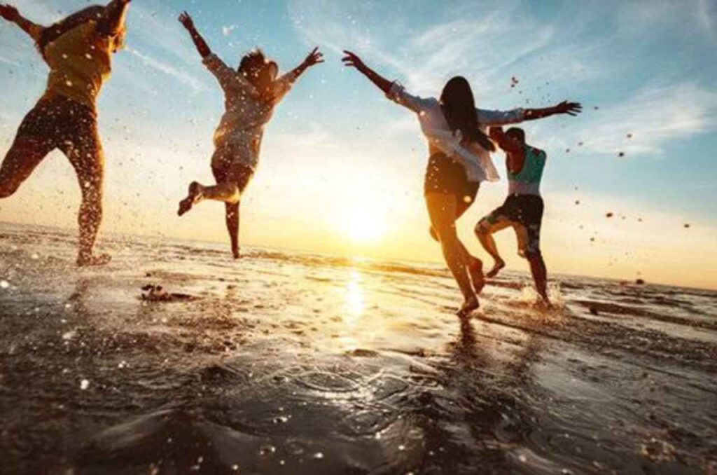 Adolescents enjoying freedom outdoors as a symbol of hope, emotional healing and wellbeing through counselling.