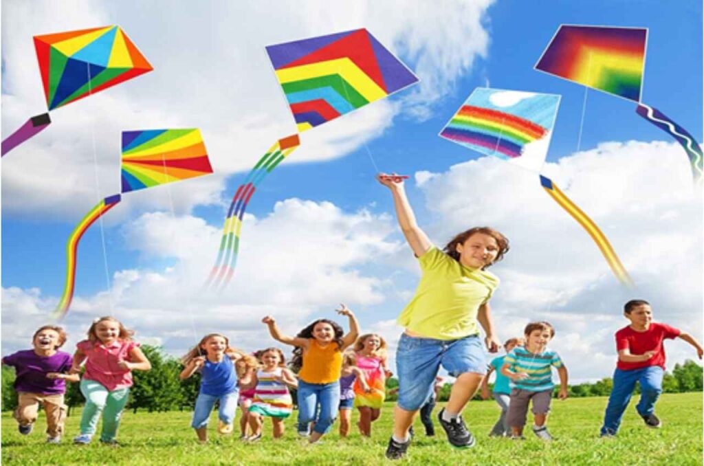 Children flying kites outdoors as a symbol of hope, emotional healing and family support in pastoral counselling.